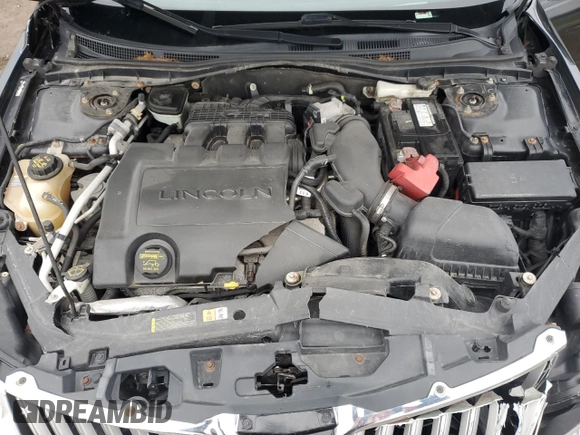 2012 Lincoln MKZ z VIN 3LNHL2JC3CR816733, wystawiony jako Copart lot #51353215 z przebiegiem 149 256 mil mil oraz Szkoda całkowita • Salvage title. Historia ofert i sprzedaży dostępna na DreamBid. Obrazek 13.