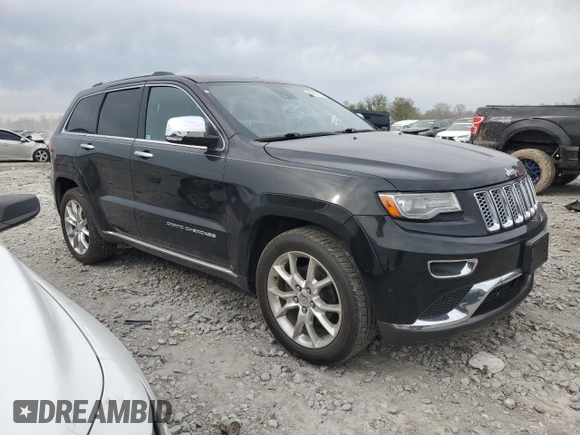 2014 Jeep Grand Cherokee Summit with VIN 1C4RJFJG1EC323658, listed as a Copart auction lot 50740115 with 253,656 mi miles and Salvage title. Bid and sale history available at DreamBid. Image 4.