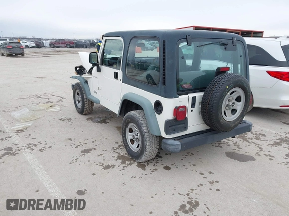 1998 Jeep Wrangler SE with VIN 1J4FY29P9WP793260, listed as a IAAI auction lot 41596990 with 90,766 mi miles. Bid and sale history available at carsss.com. Image 3.