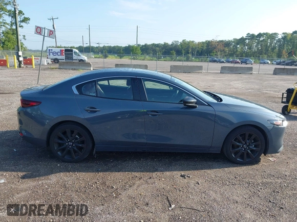 2024 Mazda 3 S Carbon Edition with VIN 3MZBPBCM6RM411828, listed as a IAAI auction lot 42802141 with 40,061 mi miles and . Bid and sale history available at DreamBid. Image 13.