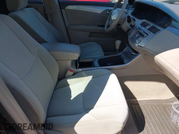 2005 Toyota Avalon XL with VIN 4T1BK36B95U048332, listed as a IAAI auction lot 41977547 with 61,293 mi miles and . Bid and sale history available at carsss.com. Image 5.