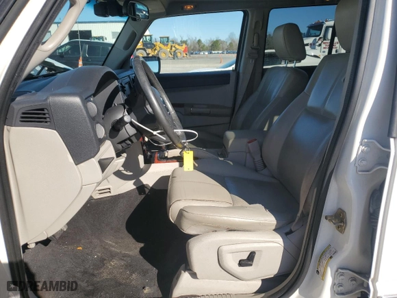 2007 Jeep Commander Limited with VIN 1J8HG58P67C552987, listed as a Copart auction lot 85738054 with 166,785 mi miles and Salvage Title. Bid and sale history available at carsss.com. Image 7.
