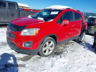 2016 Chevrolet Trax LTZ with VIN KL7CJRSB3GB569465, listed as a IAAI auction lot 41271637 with 152,503 mi miles. Bid and sale history available at carsss.com. Image 17.