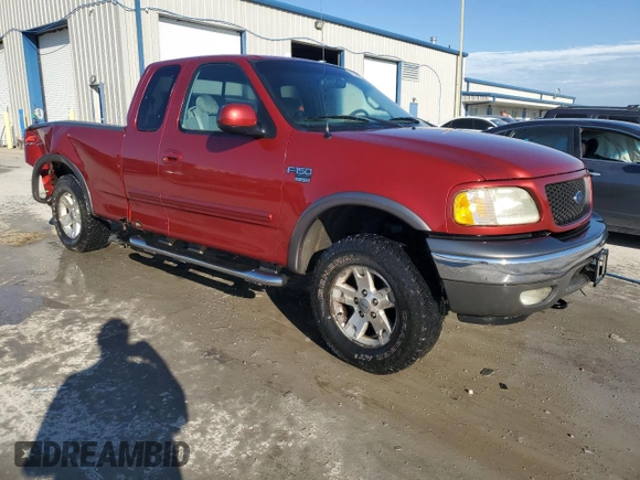 2002 Ford F-150 XL with VIN 1FTRX18L82NA54692, listed as a Copart auction lot 62559605 with 216,350 mi miles and Salvage title. Bid and sale history available at DreamBid. Image 4.
