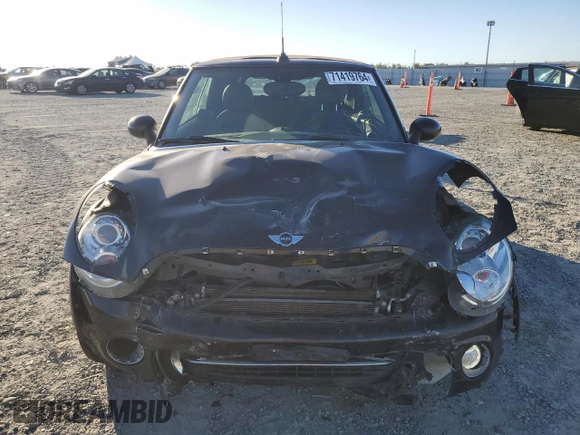 2015 MINI Convertible with VIN WMWZN3C53FT862859, listed as a Copart auction lot 71419764 with 113,356 mi miles and Salvage title. Bid and sale history available at DreamBid. Image 5.