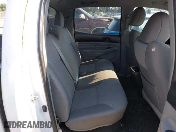 2015 Toyota Tacoma with VIN 3TMLU4EN5FM182720, listed as a IAAI auction lot 42555728 with 183,081 mi miles and . Bid and sale history available at DreamBid. Image 8.