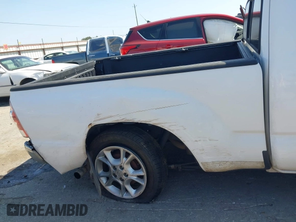 2013 Toyota Tacoma with VIN 5TFTX4CN2DX032744, listed as a IAAI auction lot 41997093 with 213,886 mi miles and . Bid and sale history available at DreamBid. Image 6.