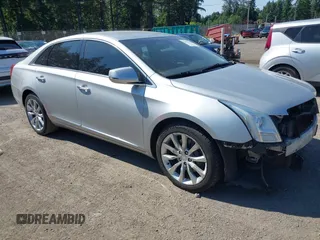 2017 Cadillac XTS Luxury z VIN 2G61M5S35H9159629, wystawiony jako IAAI lot #42432936 z przebiegiem 220 985 mil mil oraz . Historia ofert i sprzedaży dostępna na DreamBid. Obrazek 1.