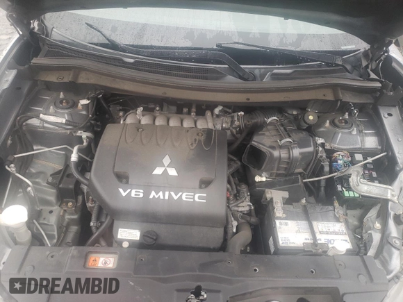 2014 Mitsubishi Outlander GT with VIN JA4JZ4AX2EZ009731, listed as a Copart auction lot 38760334 with 167,645 mi miles and Salvage title. Bid and sale history available at DreamBid. Image 12.