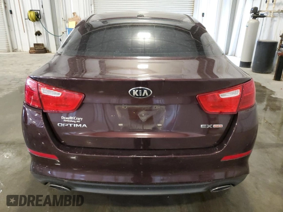2015 Kia Optima EX z VIN 5XXGN4A71FG414771, wystawiony jako Copart lot #64303495 z przebiegiem 99 907 mil mil oraz Czysty tytuł • Clean title. Historia ofert i sprzedaży dostępna na DreamBid. Obrazek 6.