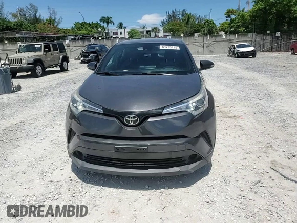 2018 Toyota C-HR XLE with VIN NMTKHMBX4JR042316, listed as a Copart auction lot 61789115 with 67,886 mi miles and Salvage title. Bid and sale history available at DreamBid. Image 14.