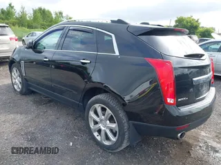 2015 Cadillac SRX Performance Collection with VIN 3GYFNFE35FS591343, listed as a IAAI auction lot 42644949 with 118,718 mi miles and . Bid and sale history available at DreamBid. Image 3.