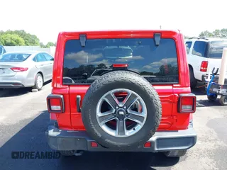 2021 Jeep Wrangler Unlimited Sahara with VIN 1C4HJXEN8MW622359, listed as a IAAI auction lot 42328958 with 100,450 mi miles and . Bid and sale history available at DreamBid. Image 16.
