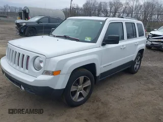 2016 Jeep Patriot High Altitude Edition with VIN 1C4NJRFB3GD753248, listed as a IAAI auction lot 42005423 with 165,229 mi miles. Bid and sale history available at carsss.com. Image 2.
