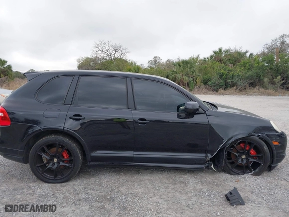 2009 Porsche Cayenne GTS with VIN WP1AD29P99LA62818, listed as a IAAI auction lot 41627073 with 166,414 mi miles. Bid and sale history available at carsss.com. Image 13.