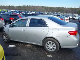 2009 Toyota Corolla with VIN JTDBL40E899083155, listed as a IAAI auction lot 41056942 with 294,132 mi miles. Bid and sale history available at carsss.com. Image 14.