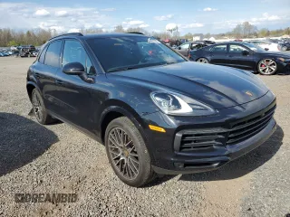 2021 Porsche Cayenne with VIN WP1AA2AY6MDA05024, listed as a Copart auction lot 52023595 with 24,455 mi miles and Salvage title. Bid and sale history available at DreamBid. Image 4.