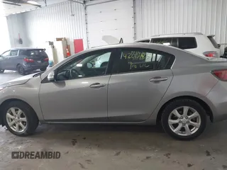 2011 Mazda Mazda3 i Touring with VIN JM1BL1VFXB1900999, listed as a IAAI auction lot 42067239 with 202,829 mi miles. Bid and sale history available at carsss.com. Image 14.