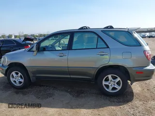 2000 Lexus RX 300 with VIN JT6GF10U0Y0055671, listed as a IAAI auction lot 41589845 with 214,320 mi miles and . Bid and sale history available at DreamBid. Image 14.