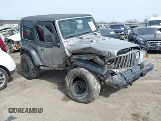 2002 Jeep Wrangler X with VIN 1J4FA39S82P707610, listed as a IAAI auction lot 41709953 with 1 mi miles. Bid and sale history available at carsss.com. Image 1.