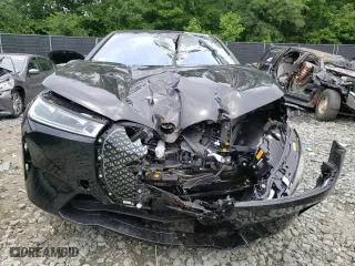 2024 BMW iX xDrive50 with VIN WB523CF09RCP70617, listed as a Copart auction lot 58091014 with 2,539 mi miles and Salvage Title. Bid and sale history available at carsss.com. Image 5.