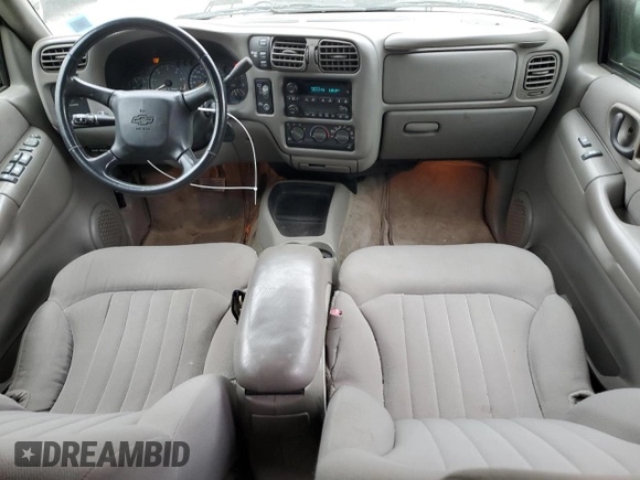 2004 Chevrolet Blazer LS z VIN 1GNDT13X84K162807, wystawiony jako Copart lot #57154205 z przebiegiem 82 732 mil mil oraz Czysty tytuł • Clean title. Historia ofert i sprzedaży dostępna na DreamBid. Obrazek 8.