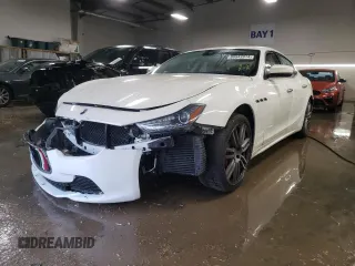 2018 Maserati Ghibli with VIN ZAM57XSL9J1287458, listed as a Copart auction lot 80543914 with 38,969 mi miles and Salvage Title. Bid and sale history available at carsss.com. Image 1.