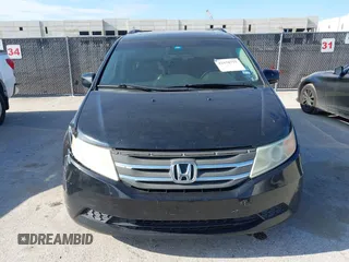 2012 Honda Odyssey EX-L z VIN 5FNRL5H63CB046447, wystawiony jako IAAI lot #42578775 z przebiegiem 247 852 mil mil oraz . Historia ofert i sprzedaży dostępna na DreamBid. Obrazek 12.