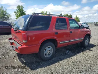 2000 Chevrolet Blazer LT z VIN 1GNDT13W8Y2392666, wystawiony jako Copart lot #56652895 z przebiegiem 223 924 mil mil oraz Szkoda całkowita • Salvage title. Historia ofert i sprzedaży dostępna na DreamBid. Obrazek 3.