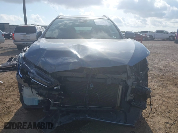 2022 Toyota Corolla Cross LE with VIN 7MUCAAAG0NV018245, listed as a IAAI auction lot 42039762 with 26,690 mi miles and . Bid and sale history available at DreamBid. Image 13.