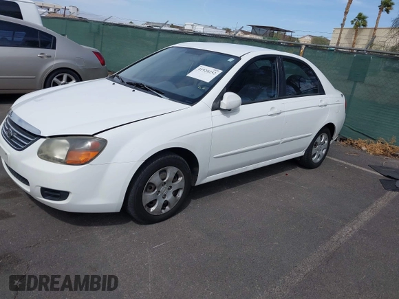 2009 Kia Spectra EX with VIN KNAFE221795630995, listed as a IAAI auction lot 41928252 with 126,694 mi miles. Bid and sale history available at carsss.com. Image 2.