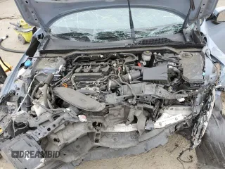 2022 Honda Civic Sport Touring z VIN 19XFL1H86NE011889, wystawiony jako Copart lot #53403415 z przebiegiem 93 619 mil mil oraz Szkoda całkowita • Salvage title. Historia ofert i sprzedaży dostępna na DreamBid. Obrazek 14.