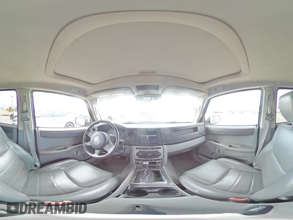 2006 Jeep Commander with VIN 1J8HG48K06C297654, listed as a Copart auction lot 51000155 with 126,235 mi miles and Salvage Title. Bid and sale history available at DreamBid. Image 13.