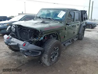 2021 Jeep Gladiator Rubicon with VIN 1C6JJTBG6ML619775, listed as a IAAI auction lot 41304732 with 37,731 mi miles. Bid and sale history available at carsss.com. Image 18.