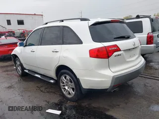 2009 Acura MDX Tech Pkg with VIN 2HNYD28689H518114, listed as a IAAI auction lot 42021557 with 303,364 mi miles. Bid and sale history available at carsss.com. Image 3.