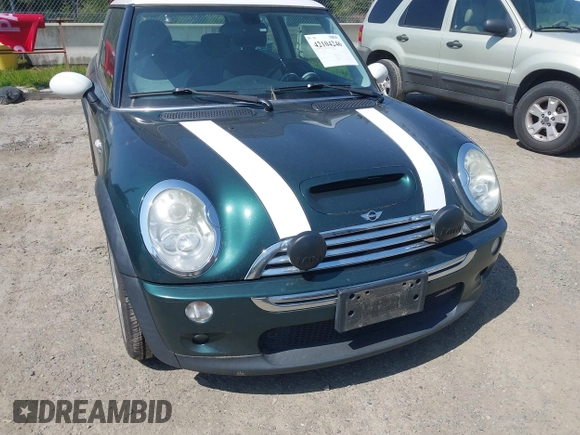 2006 MINI Hardtop S with VIN WMWRE33546TL20251, listed as a IAAI auction lot 42104246 with 140,174 mi miles and . Bid and sale history available at DreamBid. Image 6.