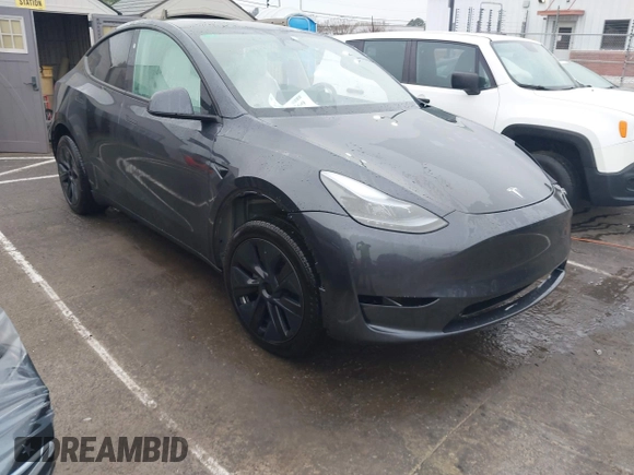 2025 Tesla Model Y Long Range with VIN 7SAYGDED8SA340082, listed as a IAAI auction lot 41915369 with 7,296 mi miles and . Bid and sale history available at DreamBid. Image 1.