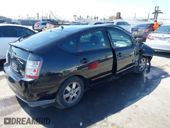 2005 Toyota Prius with VIN JTDKB20U853108017, listed as a IAAI auction lot 41848827 with 218,742 mi miles. Bid and sale history available at carsss.com. Image 4.