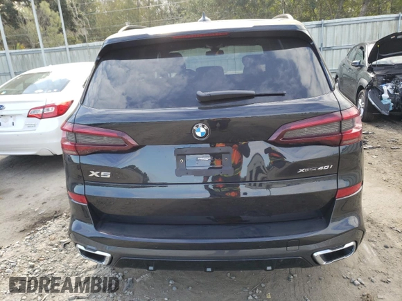 2022 BMW X5 xDrive40i with VIN 5UXCR6C05N9M87988, listed as a Copart auction lot 70896652 with 571 mi miles. Bid and sale history available at carsss.com. Image 6.