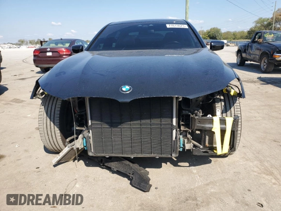 2019 BMW 7 Series 750i with VIN WBA7F0C56KGM25329, listed as a Copart auction lot 71613623 with 52,799 mi miles. Bid and sale history available at carsss.com. Image 5.