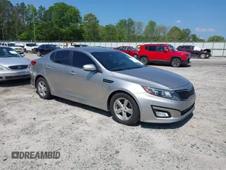 2014 Kia Optima LX with VIN KNAGM4A79E5470198, listed as a IAAI auction lot 42142484 with 169,140 mi miles. Bid and sale history available at carsss.com. Image 1.