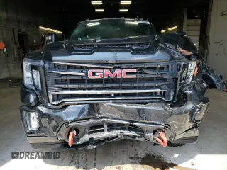 2020 GMC Sierra 2500HD AT4 z VIN 1GT49PEY7LF135671, wystawiony jako Copart lot #55740405 z przebiegiem 80 382 mil mil oraz Szkody całkowita. Historia ofert i sprzedaży dostępna na DreamBid. Obrazek 5.