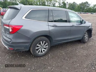 2019 Honda Pilot EX-L with VIN 5FNYF6H5XKB096065, listed as a IAAI auction lot 42631239 with 171,768 mi miles and . Bid and sale history available at DreamBid. Image 4.