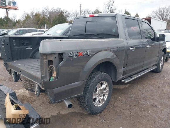 2015 Ford F-150 XLT with VIN 1FTEW1EG8FKE38679, listed as a IAAI auction lot 41526976 with 137,000 mi miles. Bid and sale history available at carsss.com. Image 4.