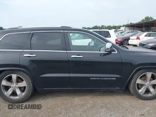 2015 Jeep Grand Cherokee High Altitude with VIN 1C4RJFCGXFC604663, listed as a IAAI auction lot 42816306 with 117,467 mi miles and . Bid and sale history available at DreamBid. Image 13.
