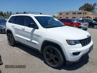 2019 Jeep Grand Cherokee Laredo E with VIN 1C4RJFAG8KC641370, listed as a IAAI auction lot 42479160 with 104,295 mi miles and . Bid and sale history available at DreamBid. Image 1.