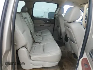 2009 Chevrolet Suburban 2LT z VIN 1GNFC26039R231768, wystawiony jako Copart lot #50708945 z przebiegiem 198 620 mil mil oraz Szkoda całkowita • Salvage title. Historia ofert i sprzedaży dostępna na DreamBid. Obrazek 11.