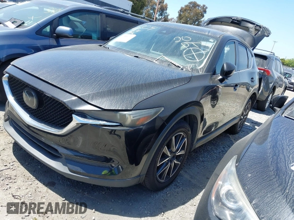 2018 Mazda CX-5 Grand Touring with VIN JM3KFADM4J0326760, listed as a IAAI auction lot 41885100 with 82,091 mi miles and . Bid and sale history available at DreamBid. Image 17.