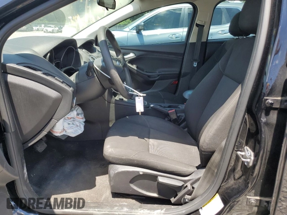 2018 Ford Focus SE z VIN 1FADP3F22JL265175, wystawiony jako Copart lot #62916255 z przebiegiem 90 348 mil mil oraz Szkoda całkowita • Salvage title. Historia ofert i sprzedaży dostępna na DreamBid. Obrazek 7.