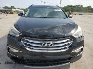 2018 Hyundai Santa Fe 2.4L с VIN 5NMZU3LB7JH060997, выставлен на аукционе Copart как лот 61026875 с пробегом 168 098 миль миль и Чистый • Clean title. История ставок и продаж доступна на DreamBid. Изображение 5.